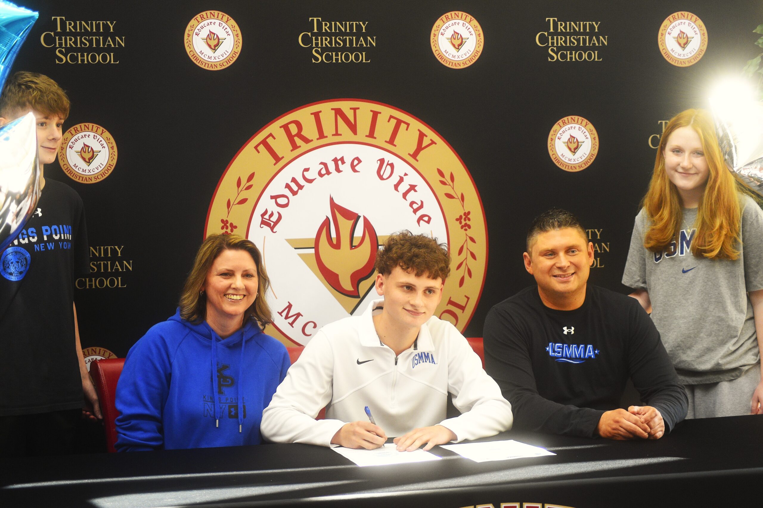 Trinity Christian all-state guard Austin Porta signs with the United States Merchant Marine Academy to continue playing, academic career